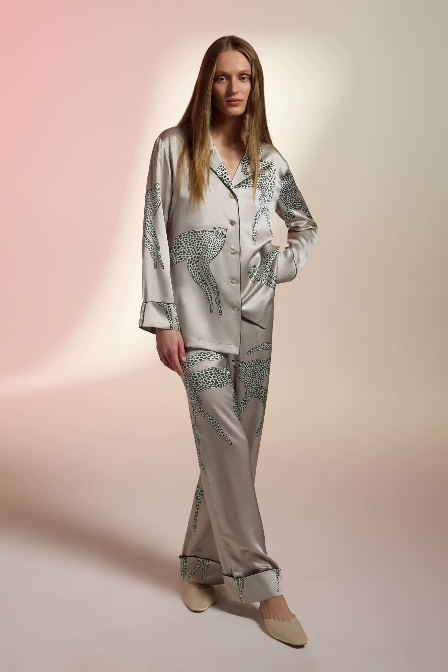 Long silk pajama set featuring an animal print design for a luxurious and stylish loungewear or party look.