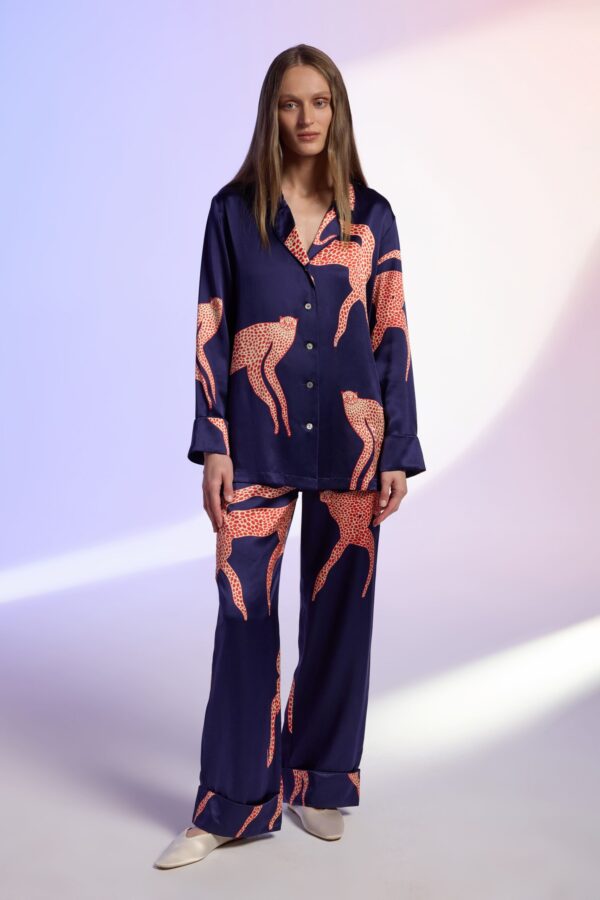 Blue silk long pajama set with bold animal print, designed for comfort and style.